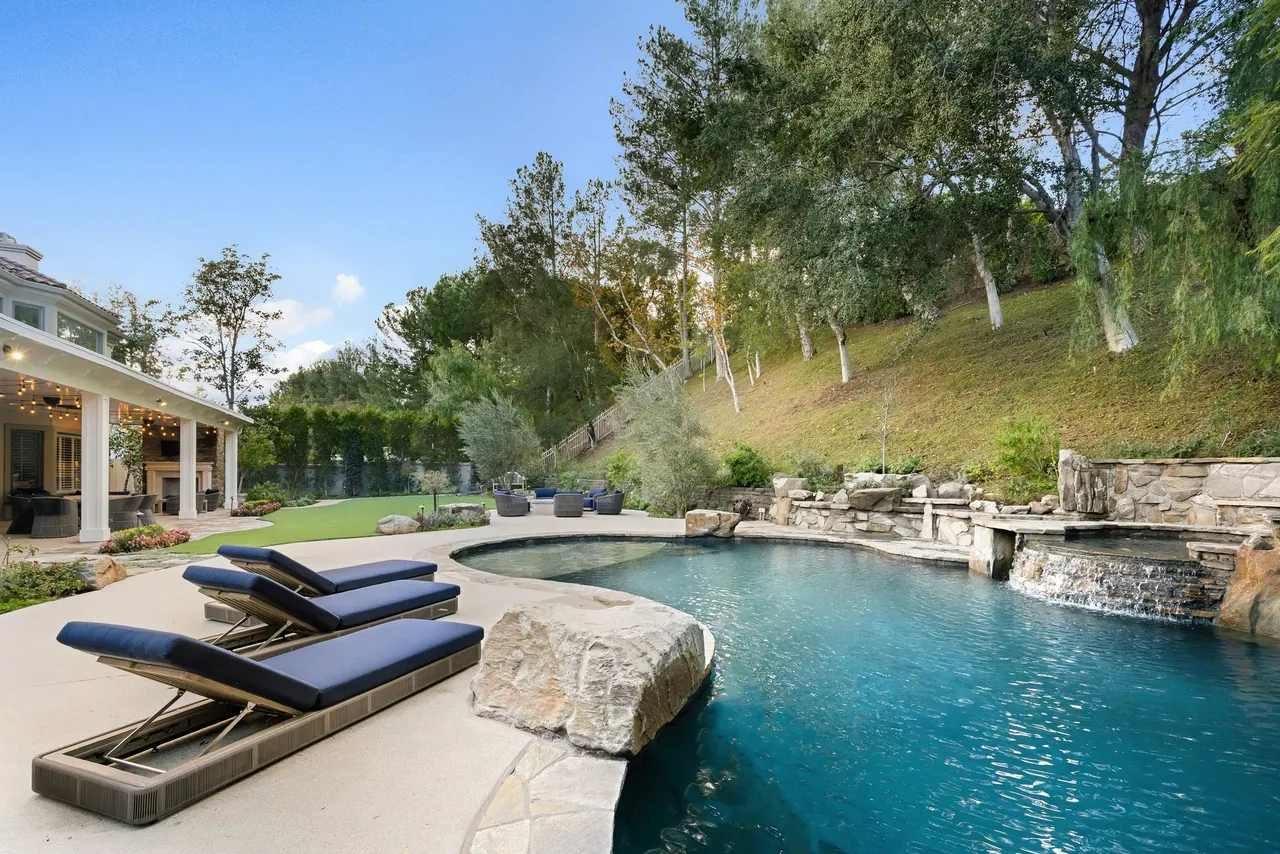 Freeform pool with waterfall